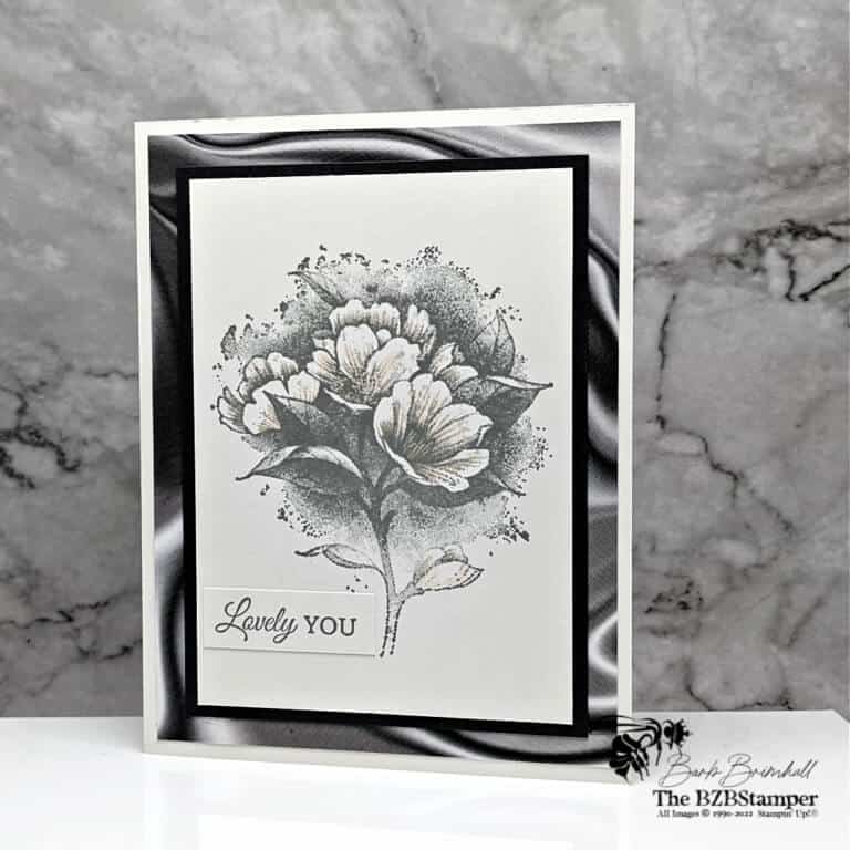 Beautiful handmade floral card in gray tones with a touch of pink