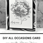 Beautiful handmade floral card in gray tones with a touch of pink