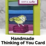 Handmade Card using the Bird's Eye View Stamp Set with a cute bird with glasses sitting on a stack of books and a "just of note" sentiment tag.