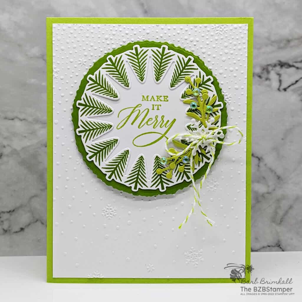 Wishes All Around Bundle by Stampin' Up! 1 Wishes All Around Bundle by Stampin' Up! featuring a circle wreath of tree images and the "make it merry" sentiment. Also includes diecut sprigs and a snowflake background.
