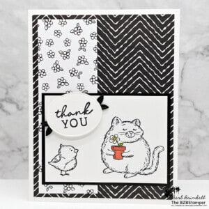 Purr-fect Handmade Card: Fluffiest Friends Stamp Set 25 Black & White thank you card with the Fluffiest Friends Stamp Set by Stampin' Up! Features black & white paper, with a kitty and bird, with a pop of color in the flower post with a single flower.