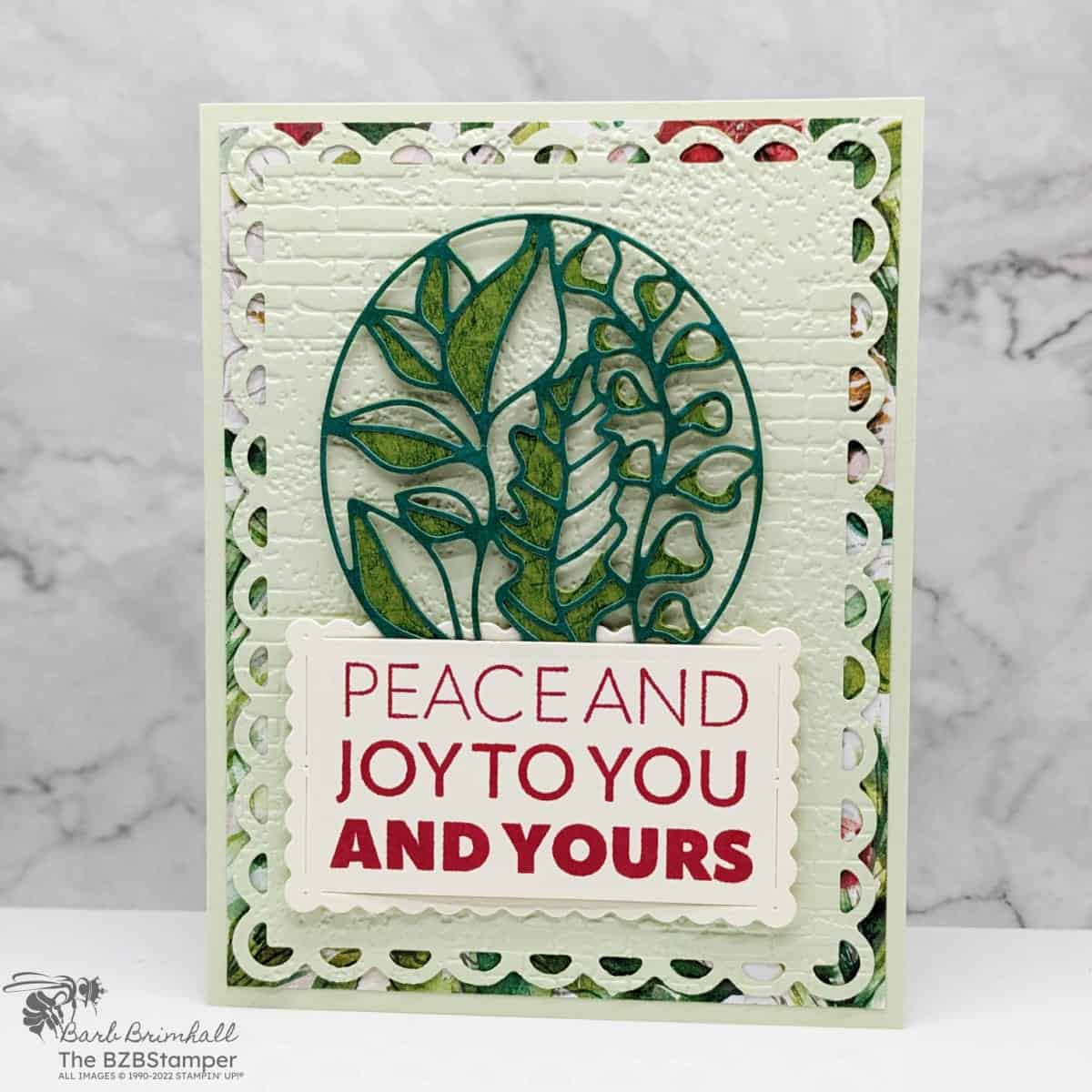 Elegant Joy To You Christmas Card 1 Elegant Joy To You Christmas card in green and red with many die-cut images and a sentiment "Peace and Joy to You and Yours."