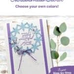 Christmas card in blues and purples featuring a wreath of snowflakes and a sentiment "sending wishes for a wondering and joyous season."