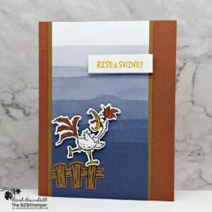 Fun Handmade Card using the Hey Chuck Bundle 20 Card featuring a rooster on a fence in browns in blues with a "rise and shine" sentiment.