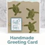 Handmade card in blue, green and crumb cake featuring 3 turtles and a "faith over fear" sentiment.