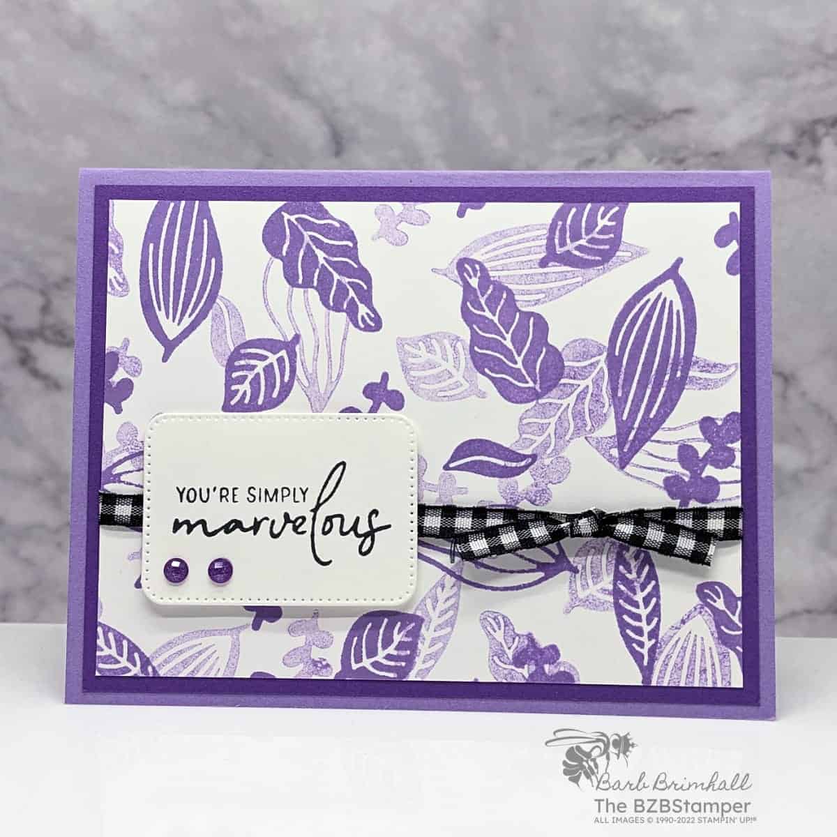 Handmade Card Using Planted Paradise Stamp Set 1 Handmade Card using Planted Paradise Stamp Set in purple with You're Simply Marvelous sentiment and black gingham ribbon.