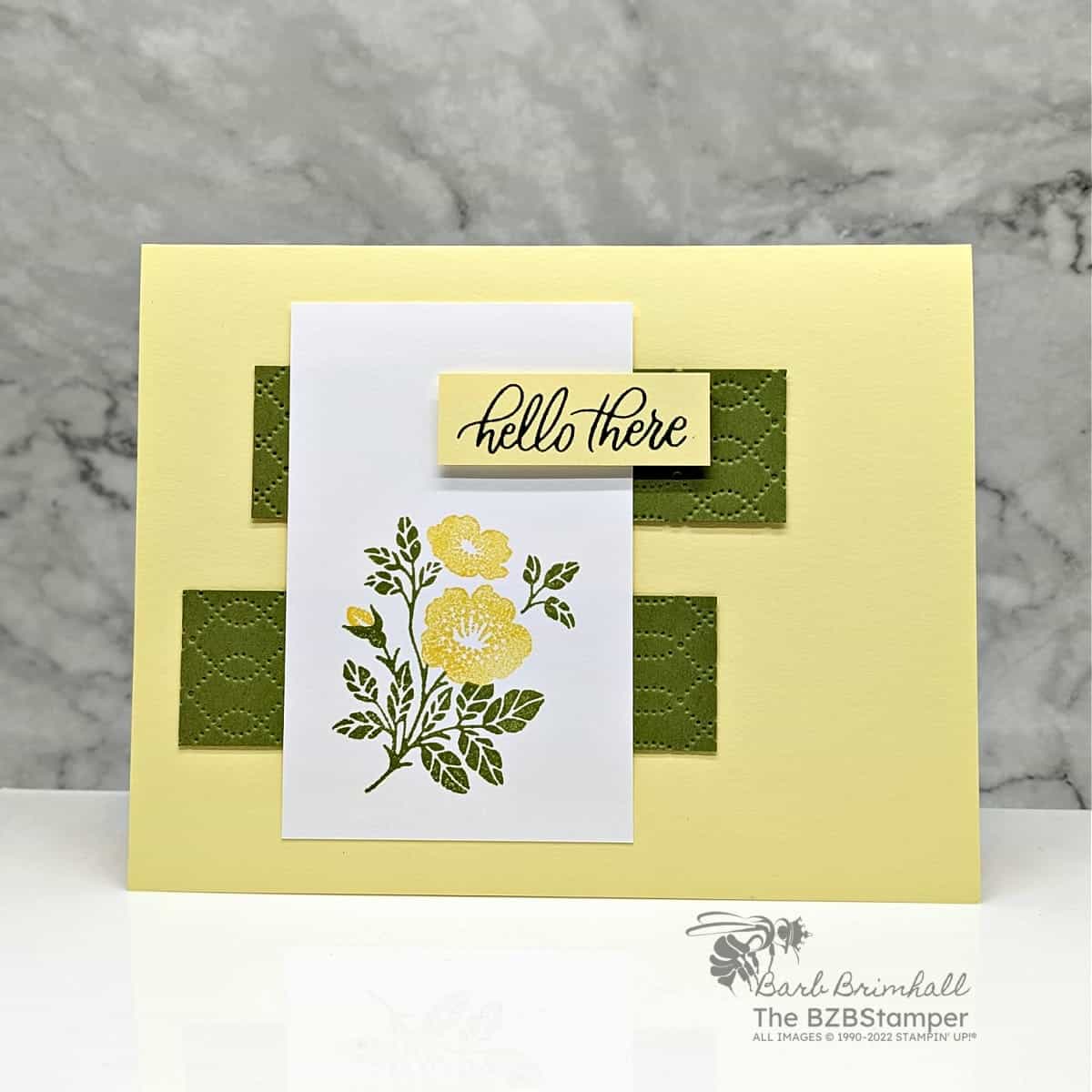 Handmade Card Using Softly Sophisticated Stamp Set 1 Handmade Card using the Softly Sophisticated Stamp Set in yellow and green with Hello There sentiment and yellow flower.