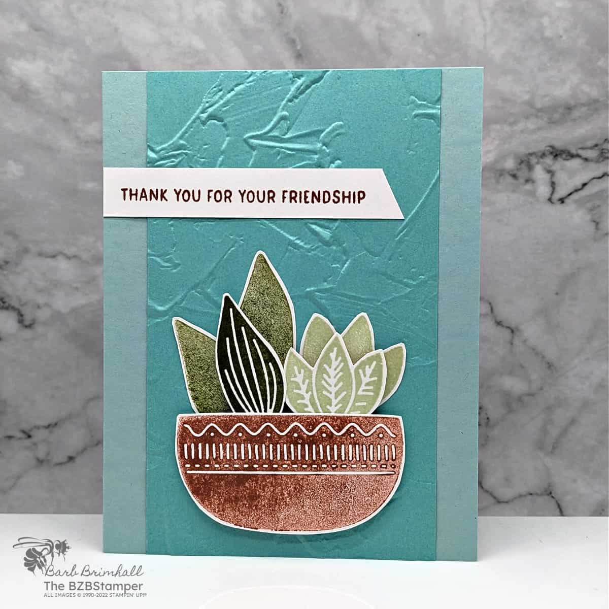 Thank You Card using the Planted Paradise Stamp Set 1 Thank You Card using the Planted Paradise Stamp Set featuring a pot with leaves in it in blues, browns and greens and a "thank you for your friendship" sentiment.
