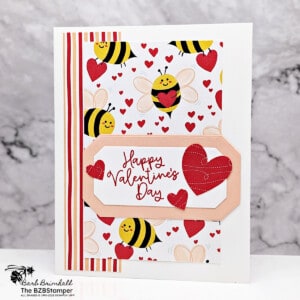 Handmade Valentine's Day Card 20 Handmade Valentine's Day Card using the Bee My Valentine Stamp Set by Stampin Up! Features pretty bee paper, red hearts, and with bee images and a Happy Valentine's Day sentiment in red ink.