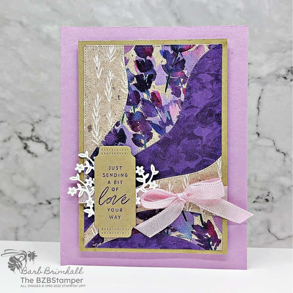 Thinking of You Card using Lovely and Sweet Bundle 1 Thinking of You Card using Lovely and Sweet Bundle in a variety of purples and kraft colors. Sentiment is "just sending a bit of love your way" making it a great all-occasion card.