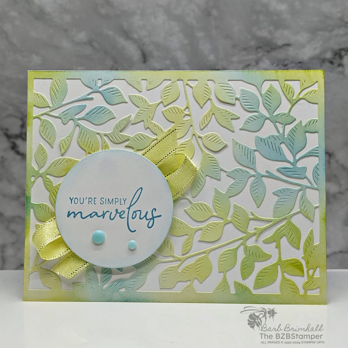 Gorgeous Garden Dies 1 Gorgeous Garden Dies in yellow, blue and green featuring a leaf die-cut and a "you're simply marvelous" on a punched circle.