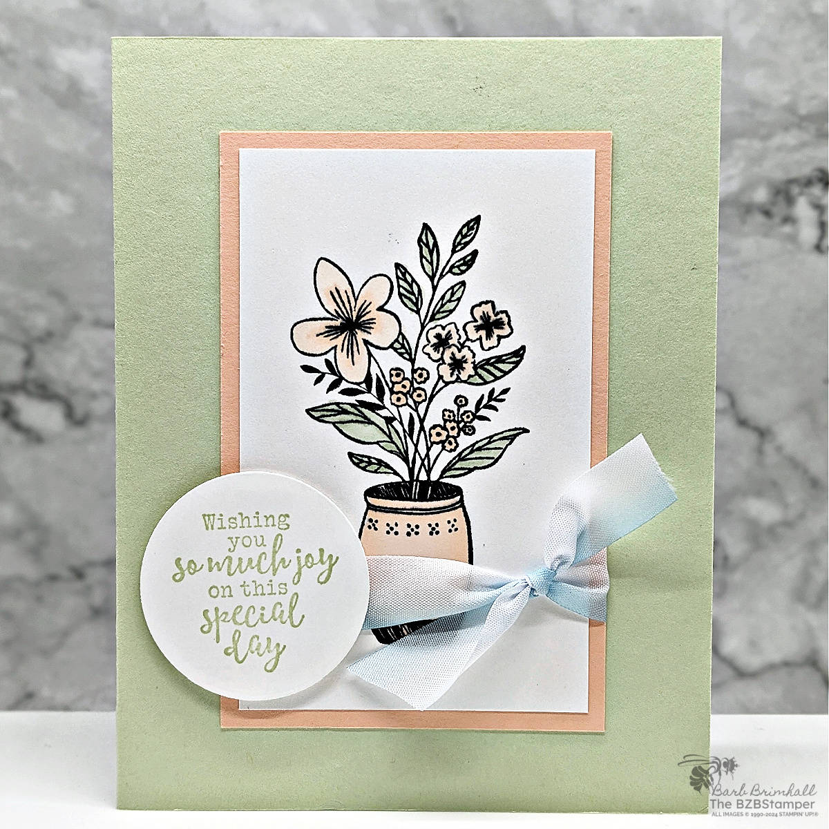 Handmade Card using the Everyday Details Stamp Set 1 Handmade Card using the Everyday Details Stamp Set in greens and pinks. Features a vase, a sentiment on a circle tag and pretty blue ribbon.