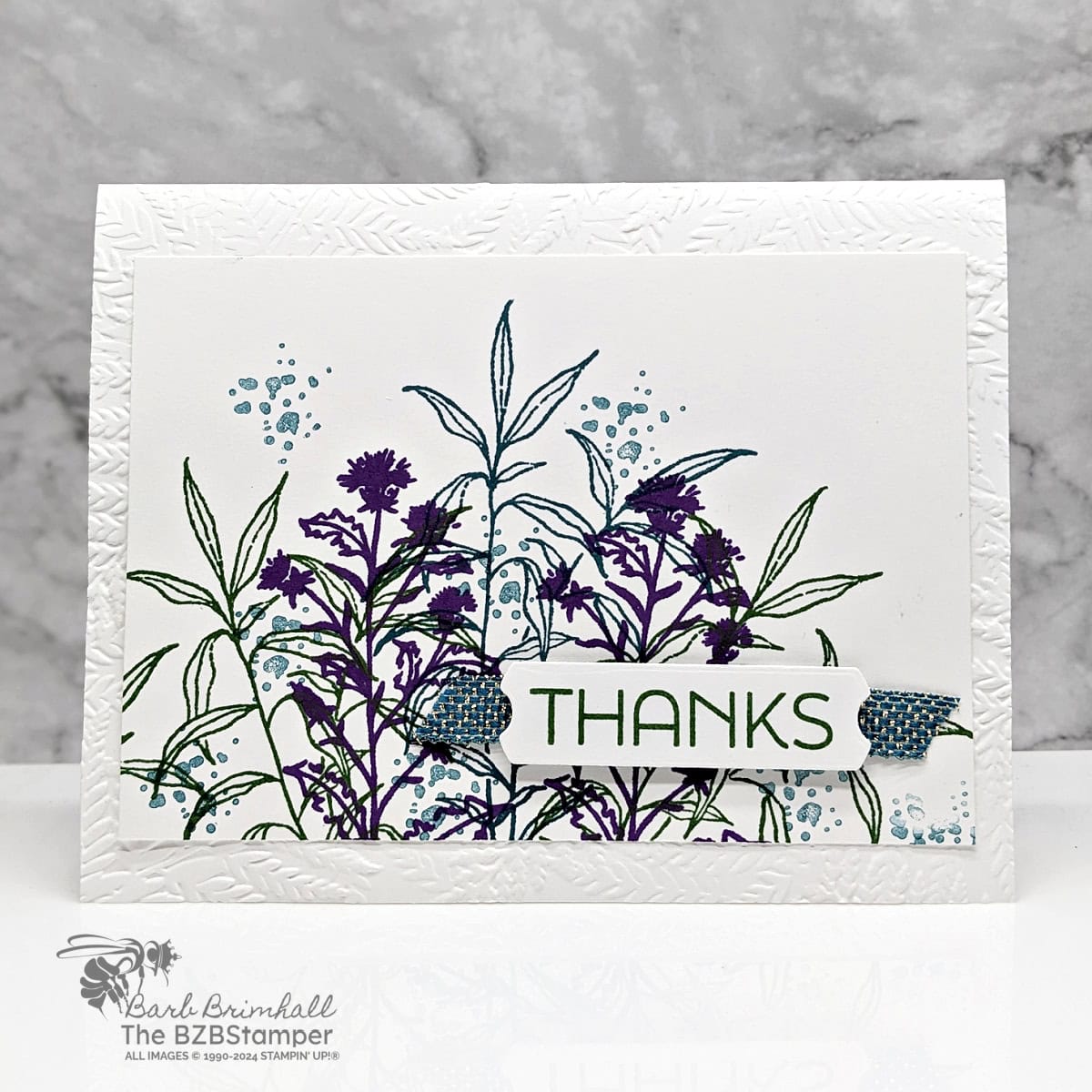Thoughtful Wishes Thank You Card 1 Thoughtful Wishes Thank You Card featuring flowers and leaves in dark blue and purple, with an embossed leaf background and a "thanks" sentiment.