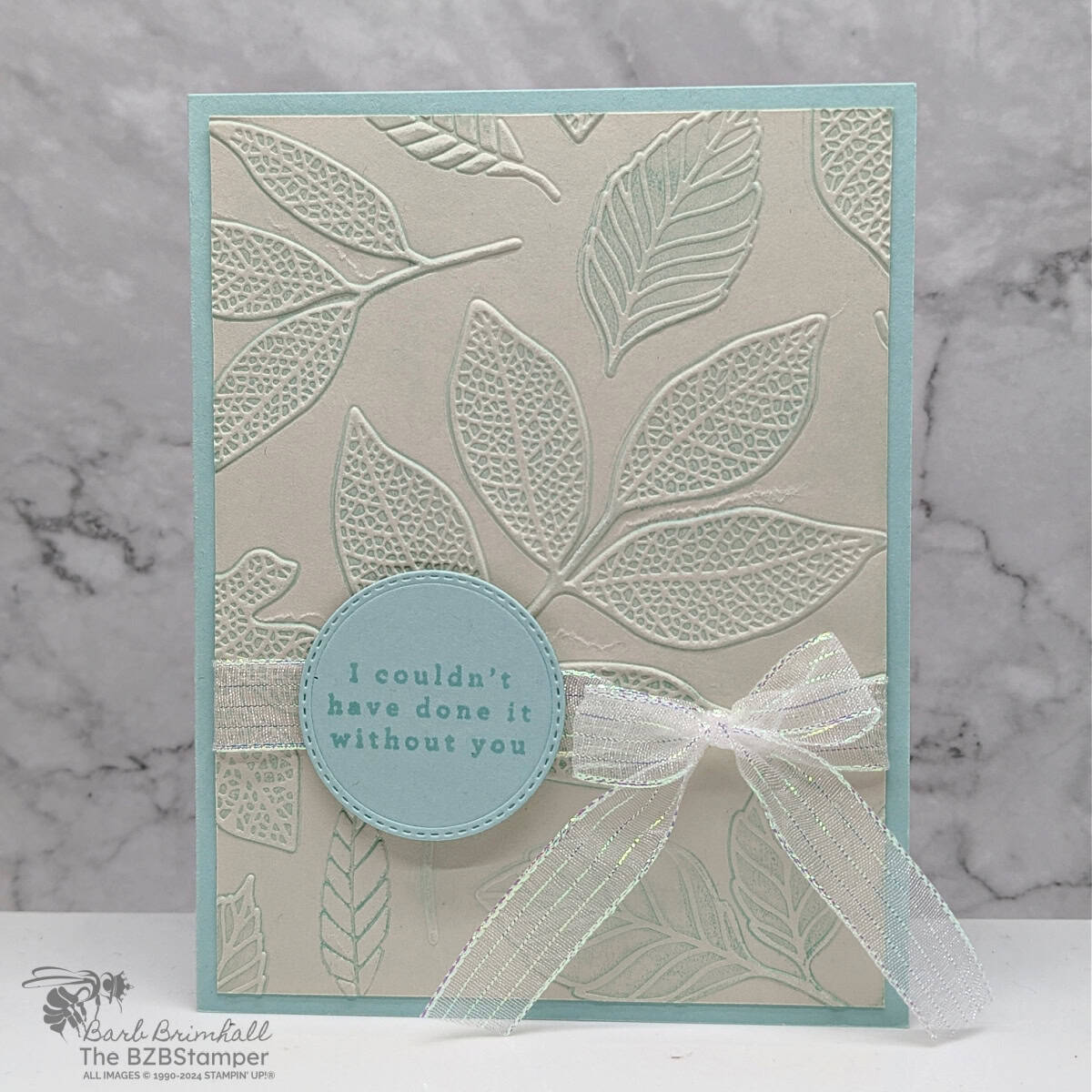 Changing Leaves Hybrid Embossing Folder 1 Changing Leaves Hybrid Embossing Folder in blues and beige with embossed leaves and a "I couldn't have done it without you" sentiment.