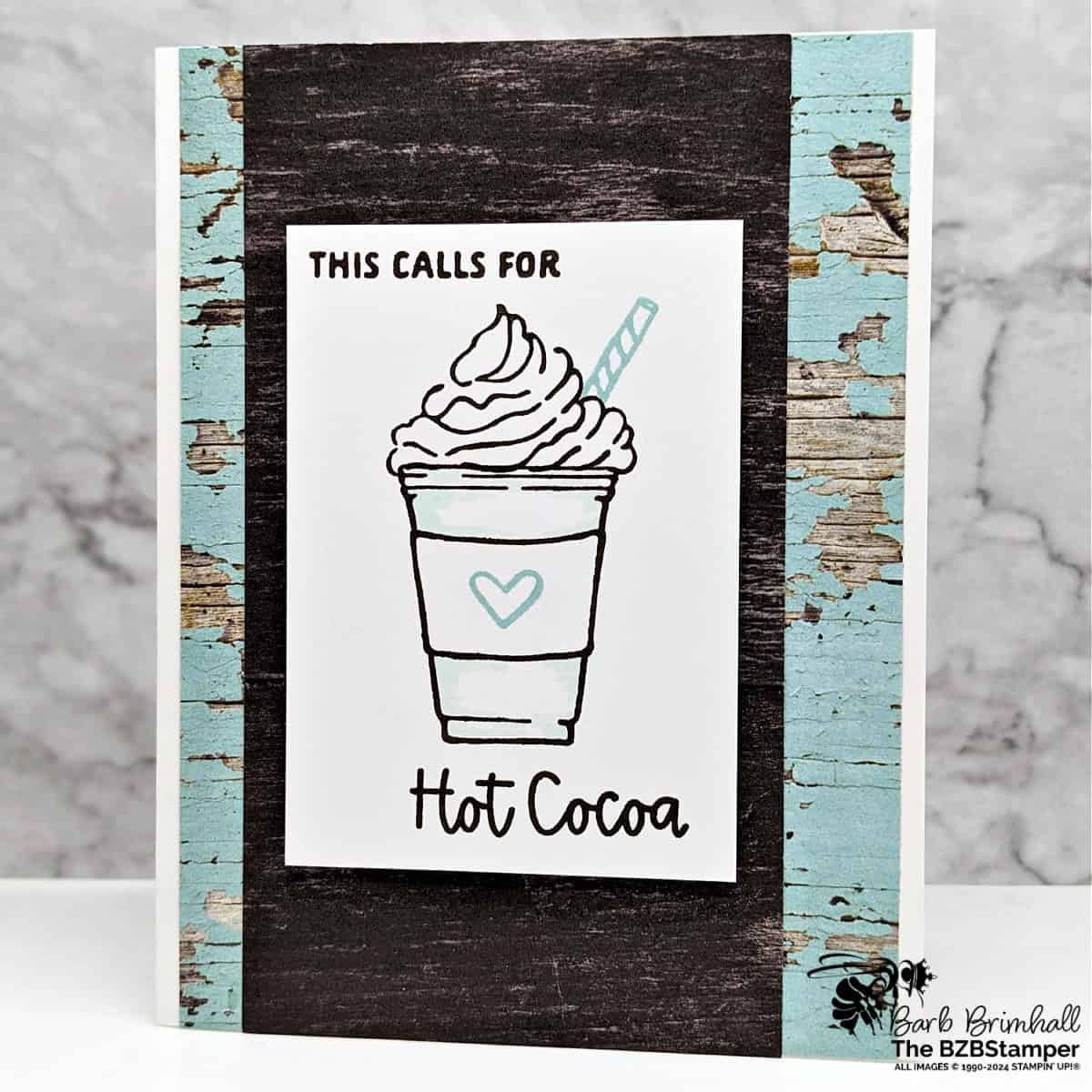 More Than Autumn Hot Cocoa Card 1 More Than Autumn Hot Cocoa Card featuring a hot cocoa drink with whipped cream and a straw in browns and blues.
