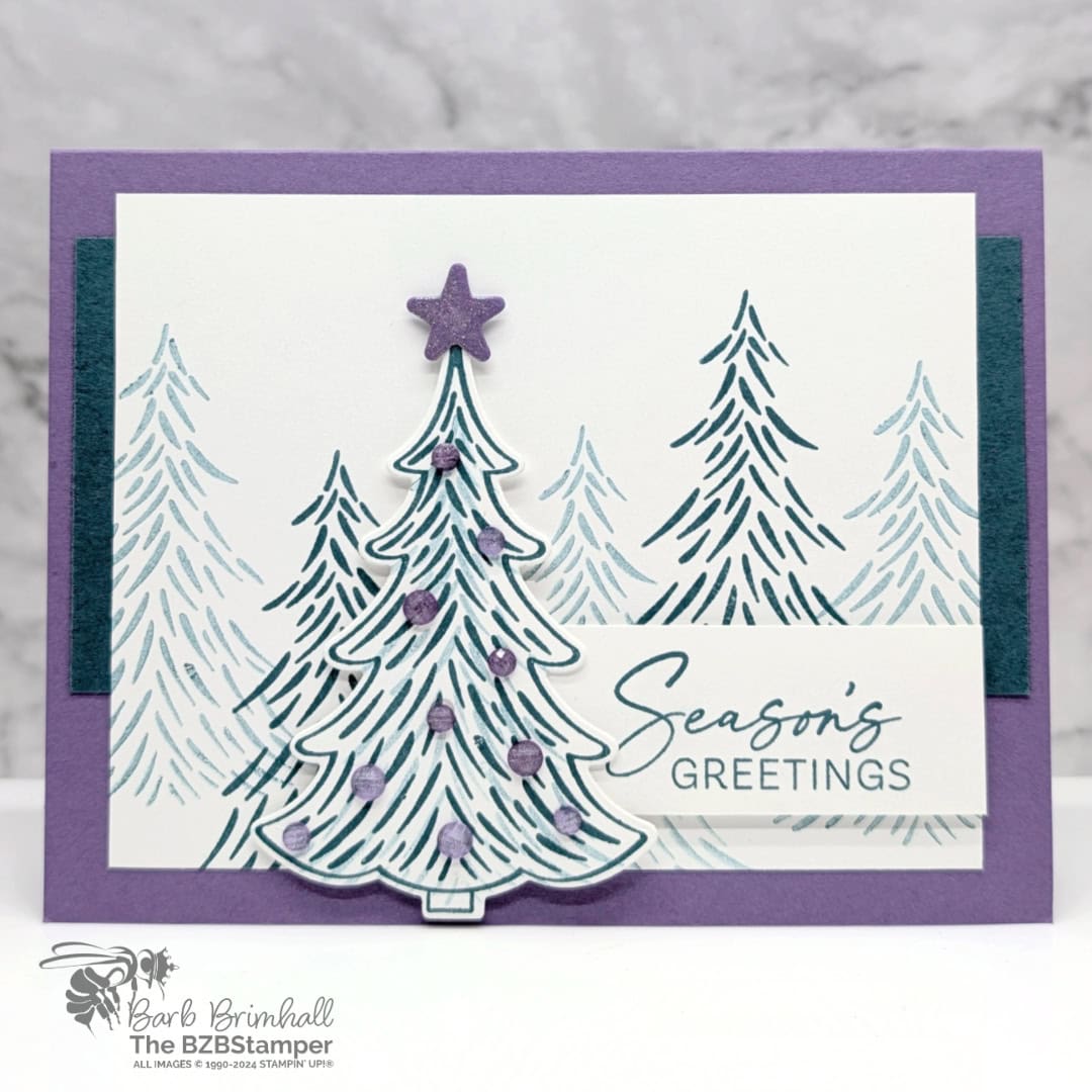 Season's Greetings with the Decorative Trees Bundle 1 Season's Greetings with the Decorative Trees Bundle featuring several fir trees in green-blue and purple accents and a "season's greetings" sentiment.