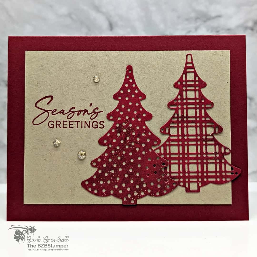 Rustic Christmas Card with the Decorative Trees Bundle 1 Rustic Christmas Card with the Decorative Trees Bundle in kraft and deep red, featuring 2 die-cut trees on the front of the card and a "Season's Greetings" sentiment.
