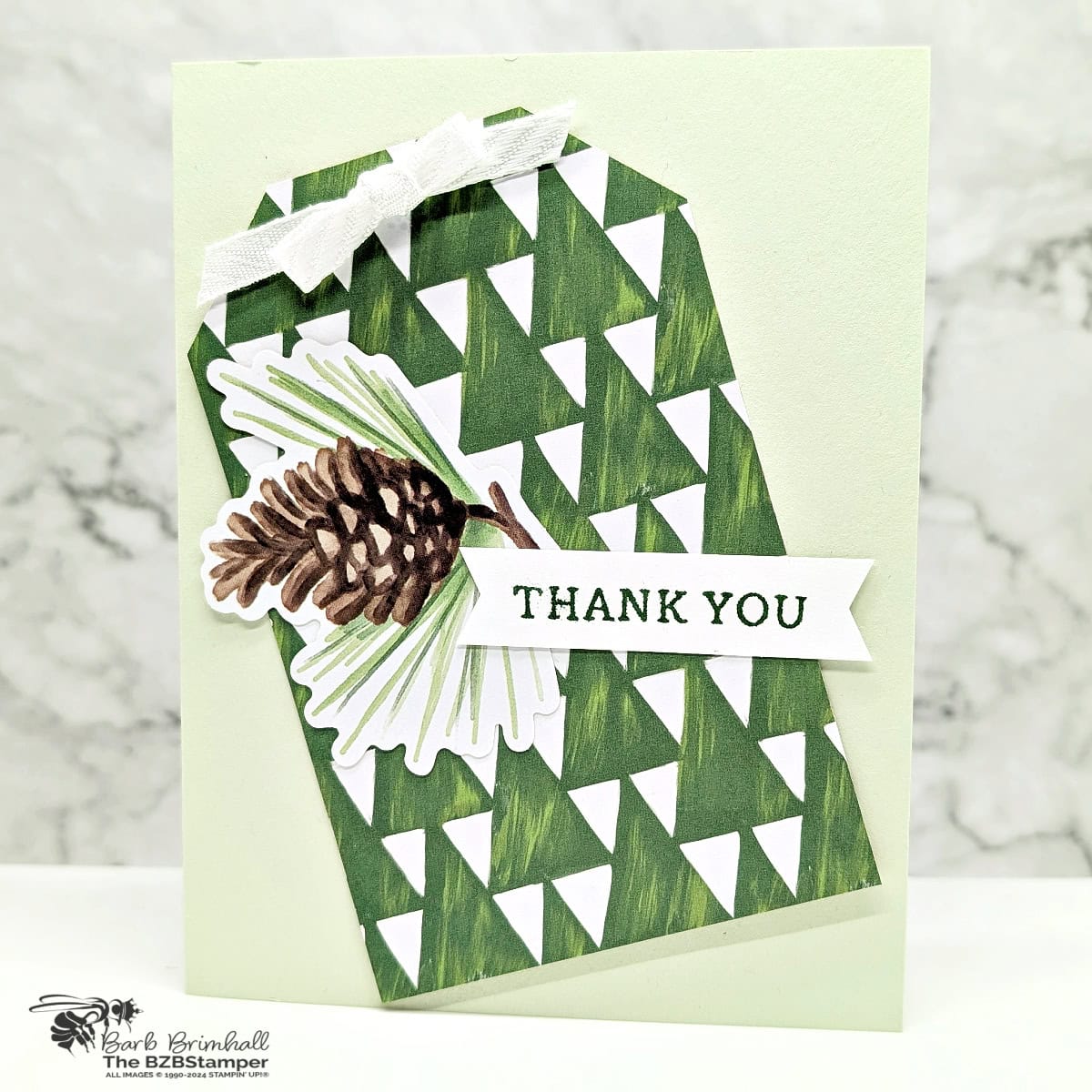 5 Minute Thank You Card using Holiday Card Sketch 8 1 5 Minute Thank You Card using Holiday Card Sketch 8 in various shades of green, featuring a paper tag and a pinecone image.