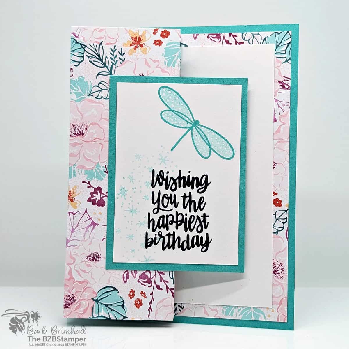 Happiest Day Fun Fold Birthday Card 1 Happiest Day Fun Fold Birthday Card featuring pretty floral paper and a dragonfly with a happy birthday sentiment. Includes a pocket die to include a gift card.
