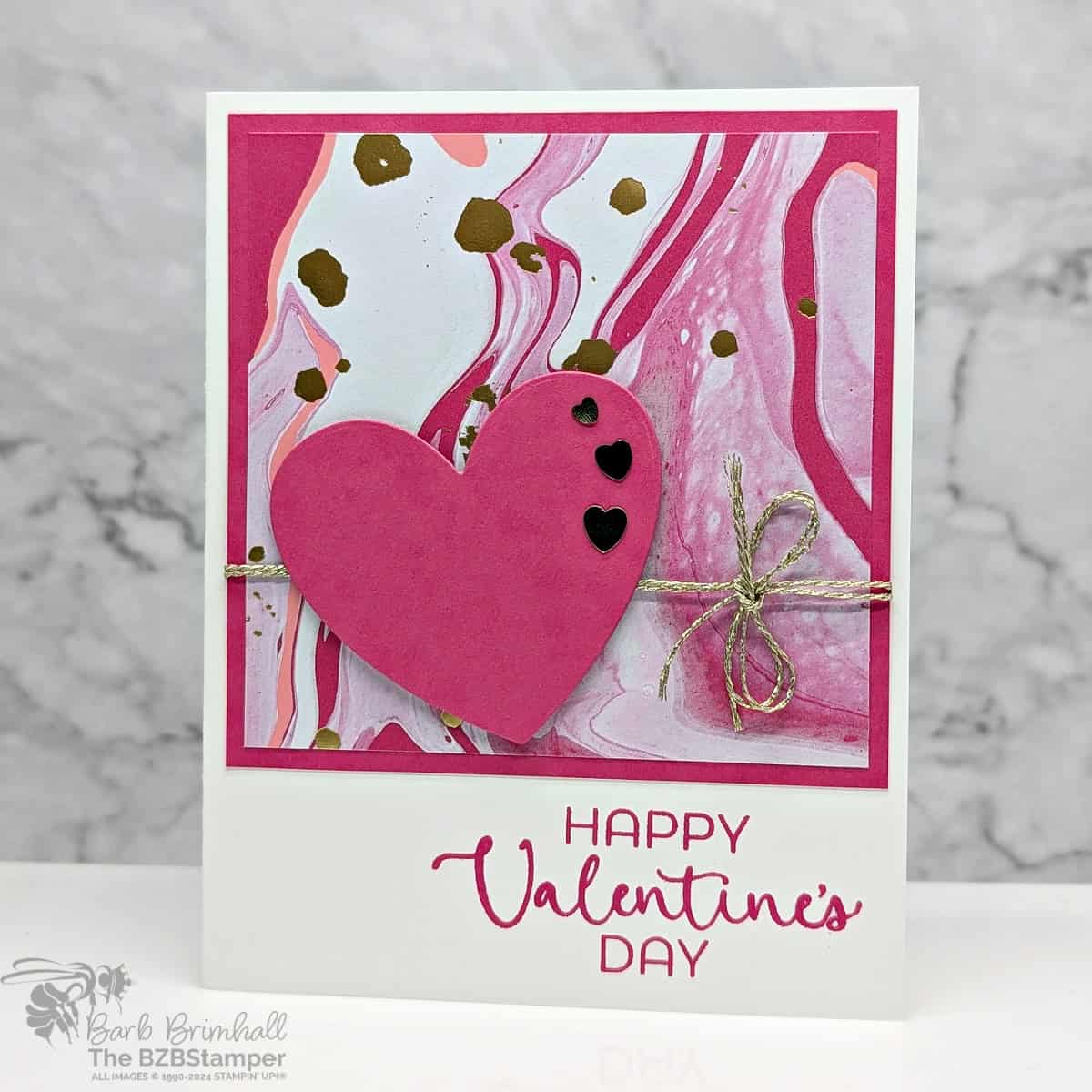 Valentine Cards with the Hearts of Elegance Suite 1 Valentine Cards with the Hearts of Elegance Suite featuring a bright pink heart with pink marbelized paper and gold accents & embellishments. Sentiment is "Happy Valentine's Day."