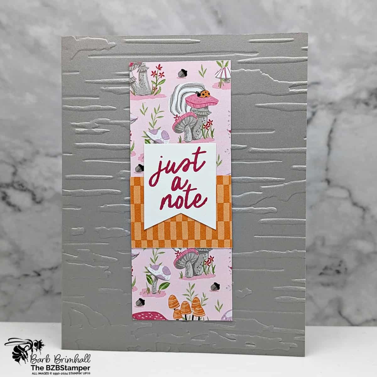 5 Minute Just a Note Card Using Card Sketch 32 with a wood embossed background and pink and orange papers.