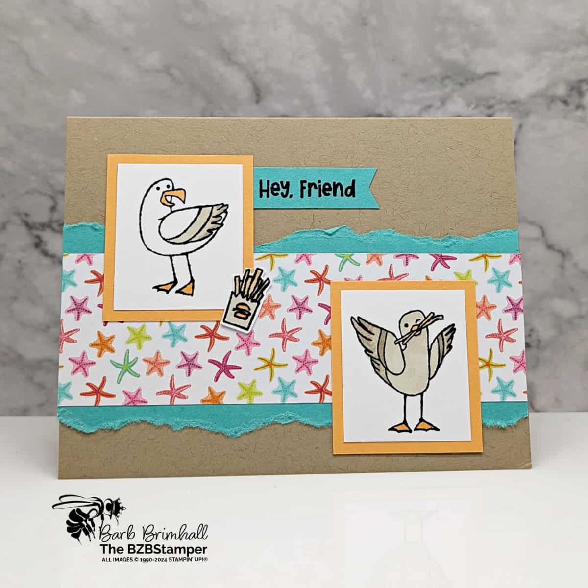 Make a Fun Friendship Card Featuring Playful Seagulls 1 Make a Fun Friendship Card Featuring Playful Seagulls sharing french fries, with pretty papers in blues, yellows and pinks and a "hey friend" sentiment.
