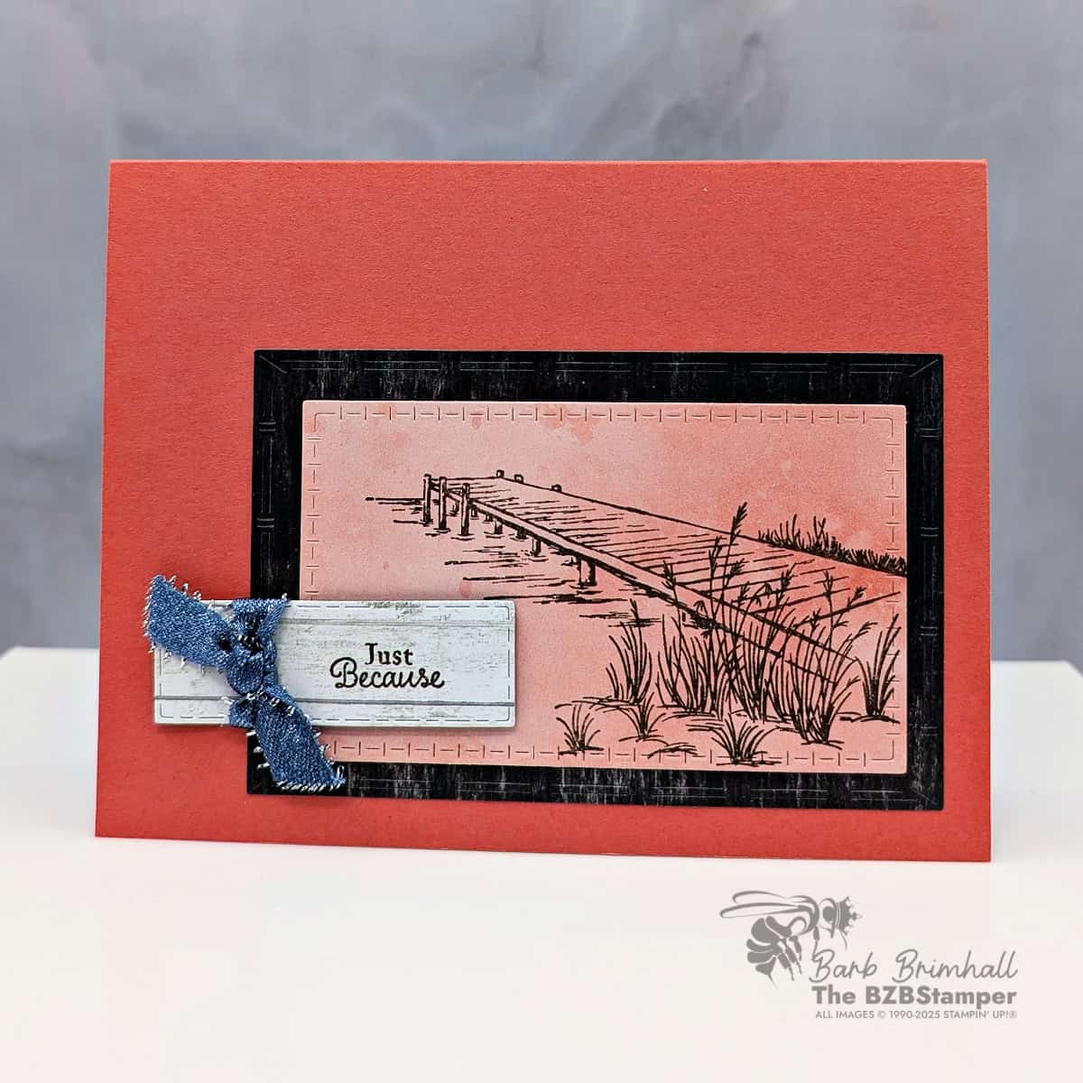 Just Because Card with the Peaceful Pier Stamp Set features a stamped pier scene in brown, layered on coral cardstock, a simple "Just Because" sentiment and ribbon accent. Masculine-friendly all-occasion card design.