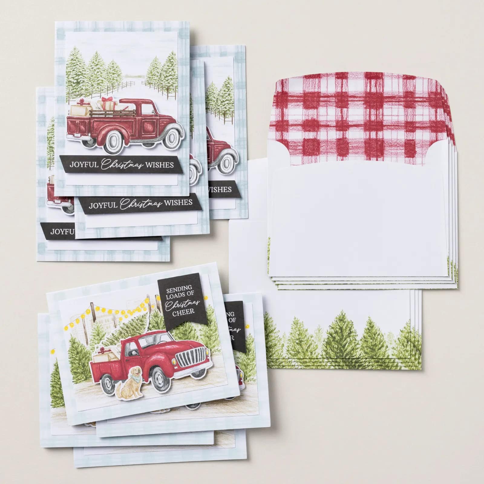 Road To Christmas Card Kit 1 Road To Christmas Card Kit featuring handmade Christmas cards with a vintage red truck, snowy tree farm backgrounds, and festive preprinted sentiments.