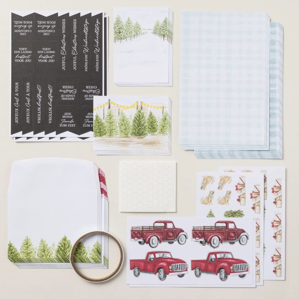 Road To Christmas Card Kit 2 Road To Christmas Card Kit featuring handmade Christmas cards with a vintage red truck, snowy tree farm backgrounds, and festive preprinted sentiments.