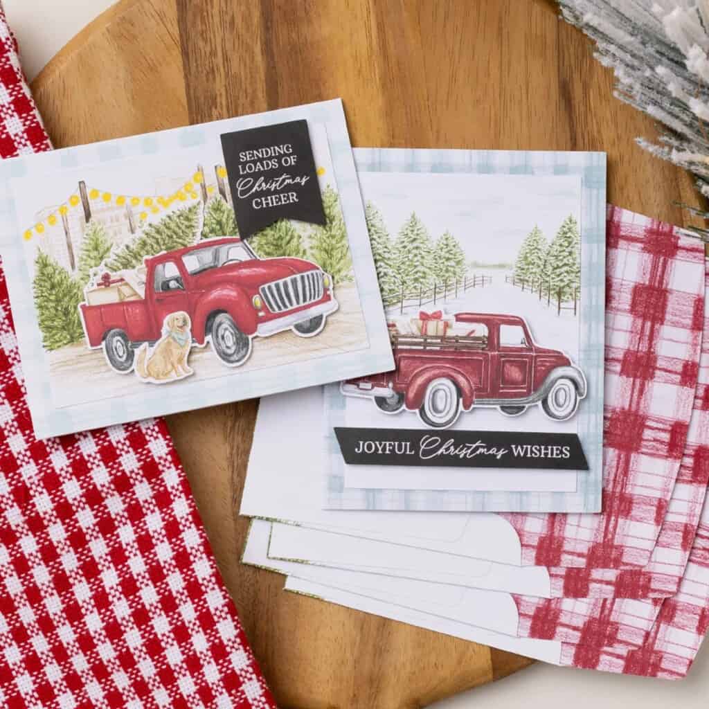 Road To Christmas Card Kit 3 Road To Christmas Card Kit featuring handmade Christmas cards with a vintage red truck, snowy tree farm backgrounds, and festive preprinted sentiments.